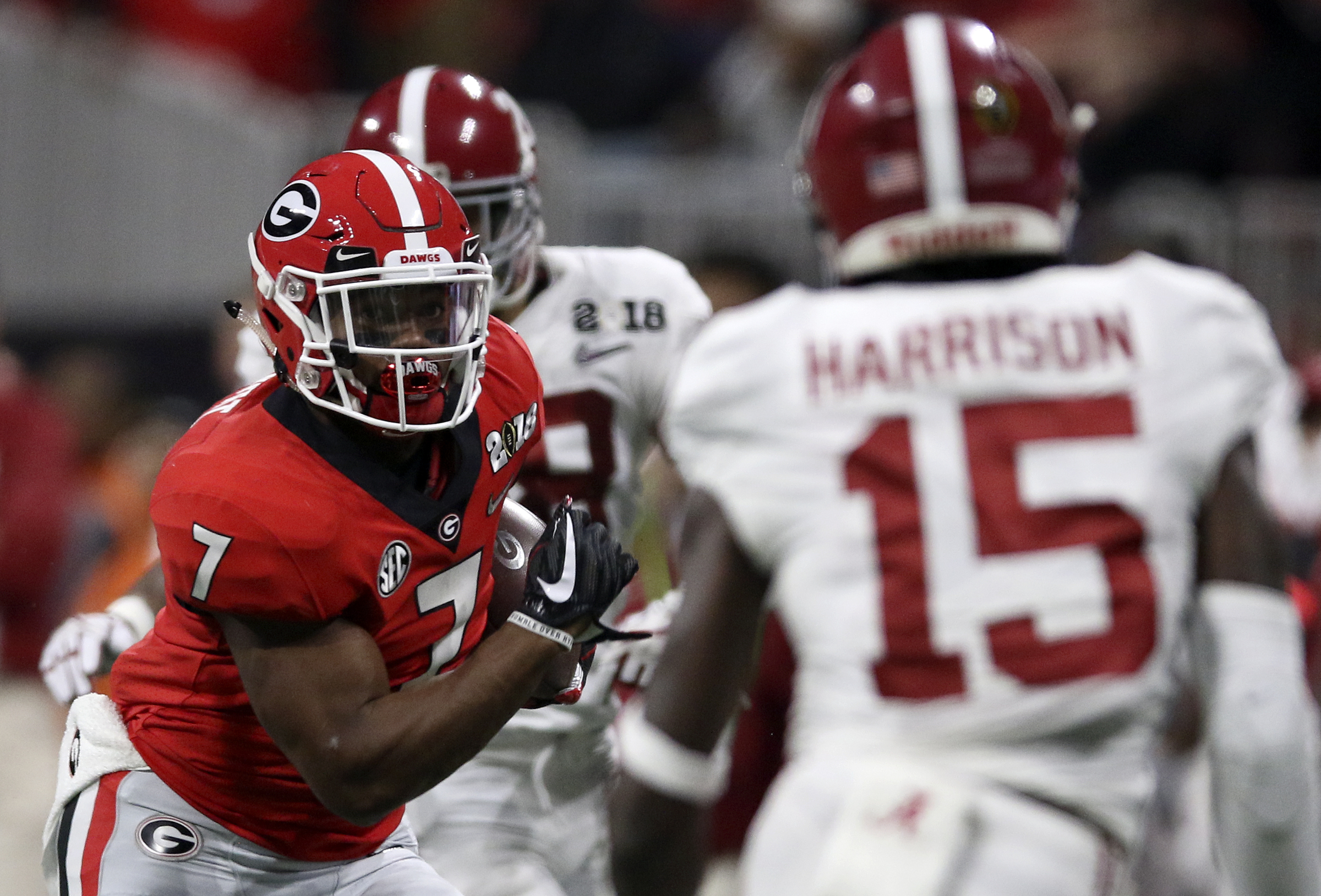 Georgia running back D'Andre Swift (7) rushes for seven yards against Alabama during the College Football Playoff national championship at Mercedes-Benz Stadium on Monday, Jan. 8, 2018 in Atlanta, Ga.