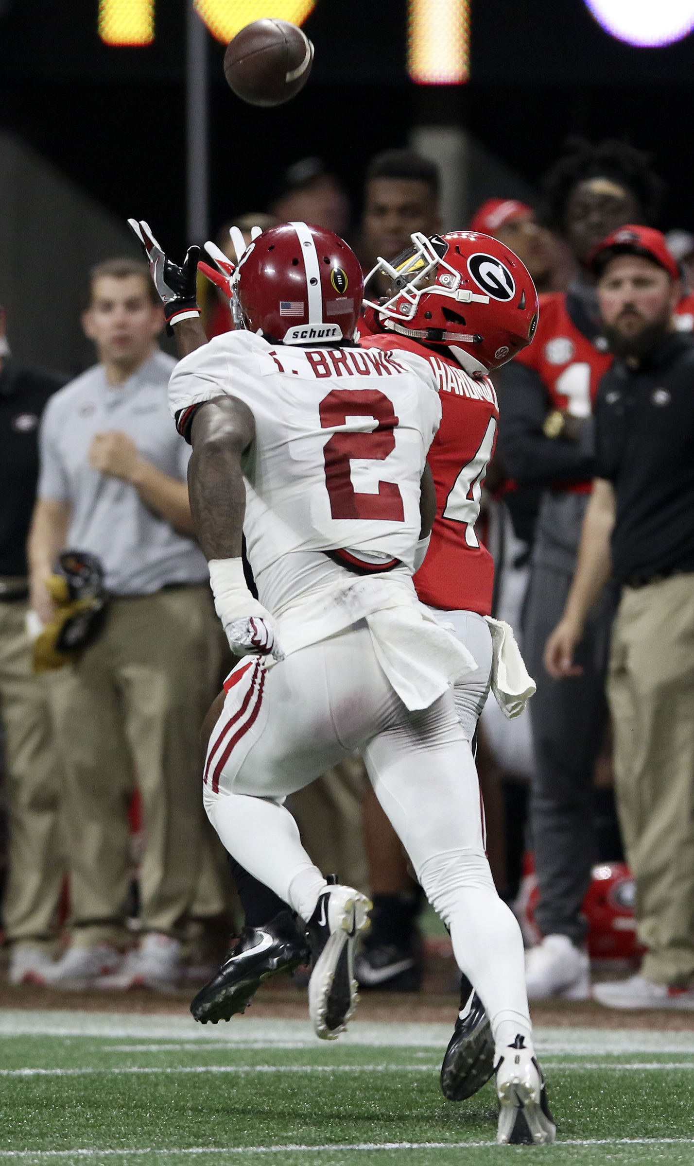 Georgia wide receiver Mecole Hardman Jr. (4) pulls in an 80-yard touchdown catch in front of Alabama defensive back Tony Brown (2) during the College Football Playoff national championship at Mercedes-Benz Stadium on Monday, Jan. 8, 2018 in Atlanta, Ga.