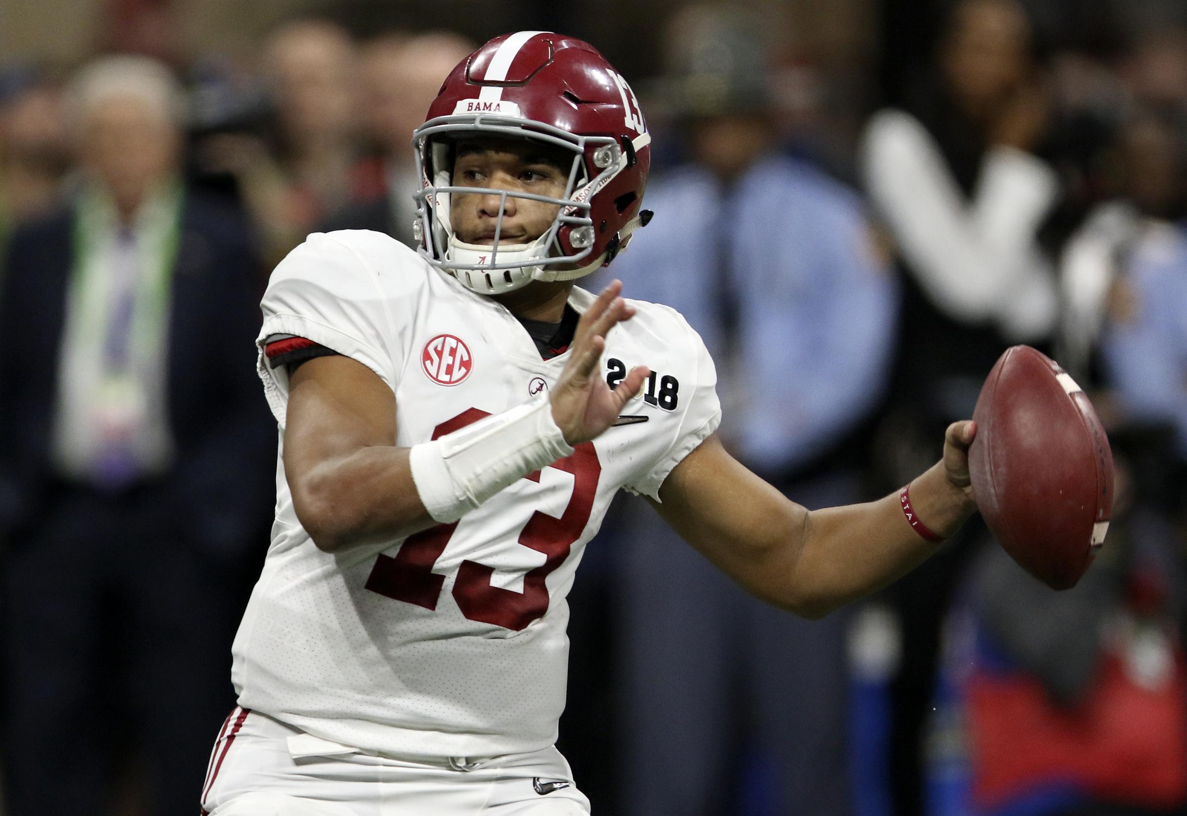 Alabama quarterback Tua Tagovailoa (13) looks to pass against Georgia during the College Football Playoff national championship at Mercedes-Benz Stadium on Monday, Jan. 8, 2018 in Atlanta, Ga.