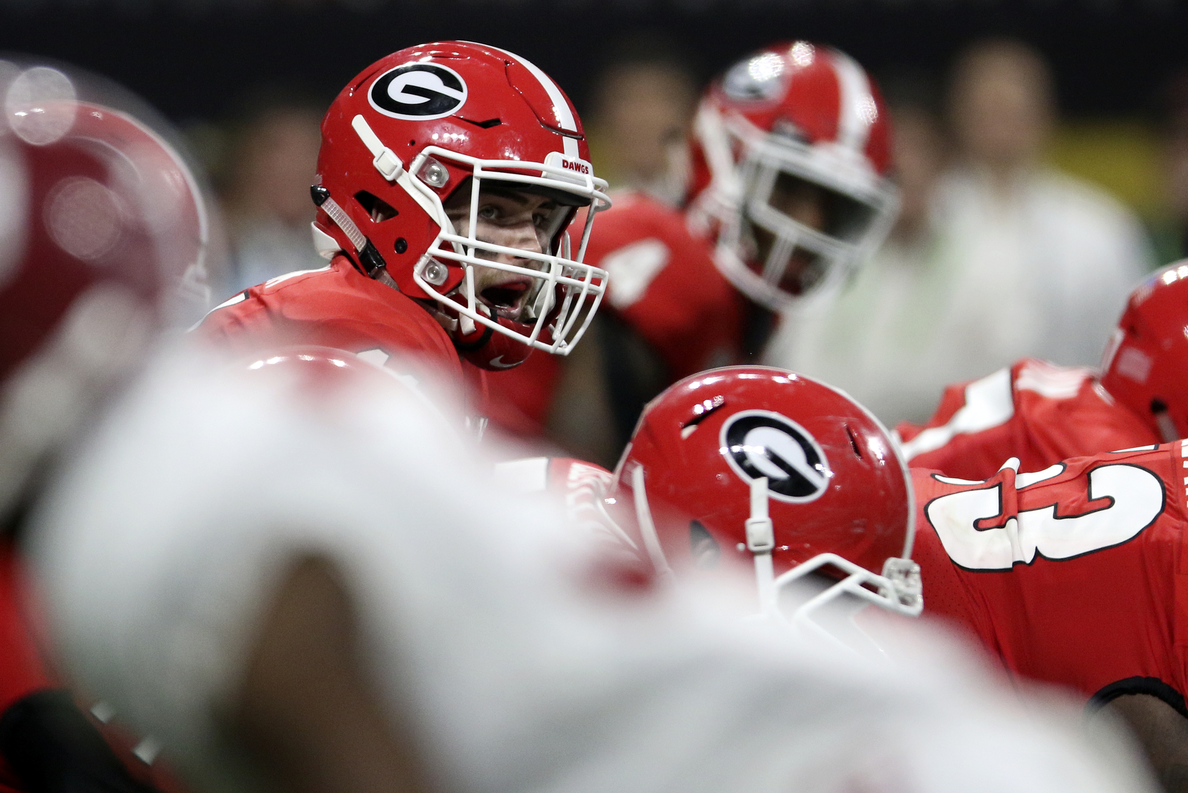 Georgia quarterback Jake Fromm (11) lines up under center during the College Football Playoff national championship against Alabama at Mercedes-Benz Stadium on Monday, Jan. 8, 2018 in Atlanta, Ga.