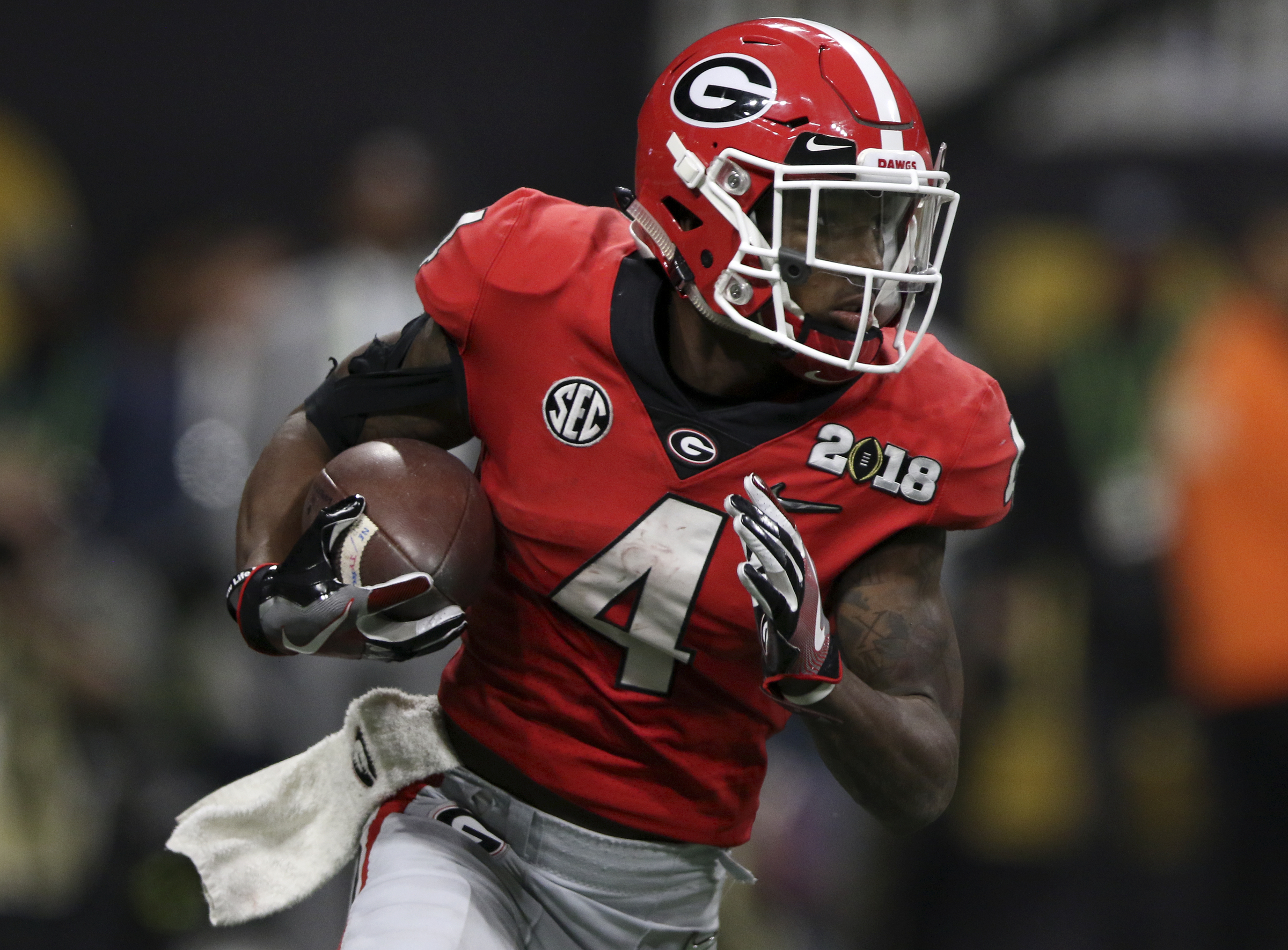 Georgia wide receiver Mecole Hardman Jr. (4) rushes for a 9-yard gain against Alabama during the College Football Playoff national championship at Mercedes-Benz Stadium on Monday, Jan. 8, 2018 in Atlanta, Ga.