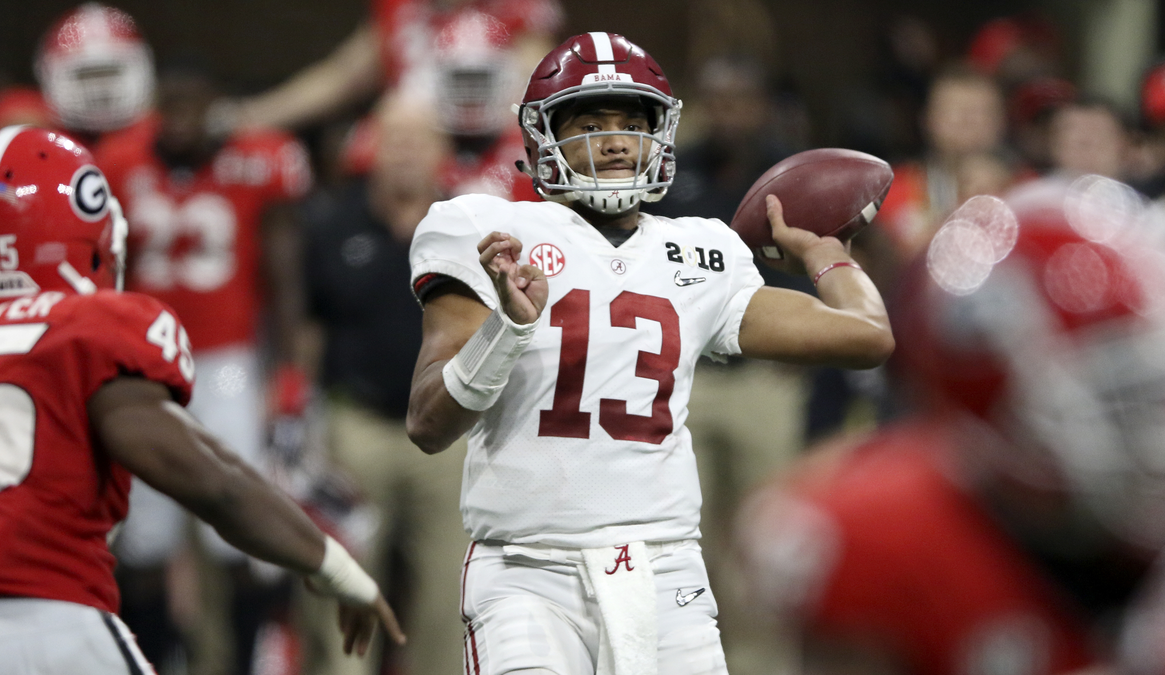 Alabama quarterback Tua Tagovailoa (13) throws a pass against Georgia during the College Football Playoff national championship at Mercedes-Benz Stadium on Monday, Jan. 8, 2018 in Atlanta, Ga.