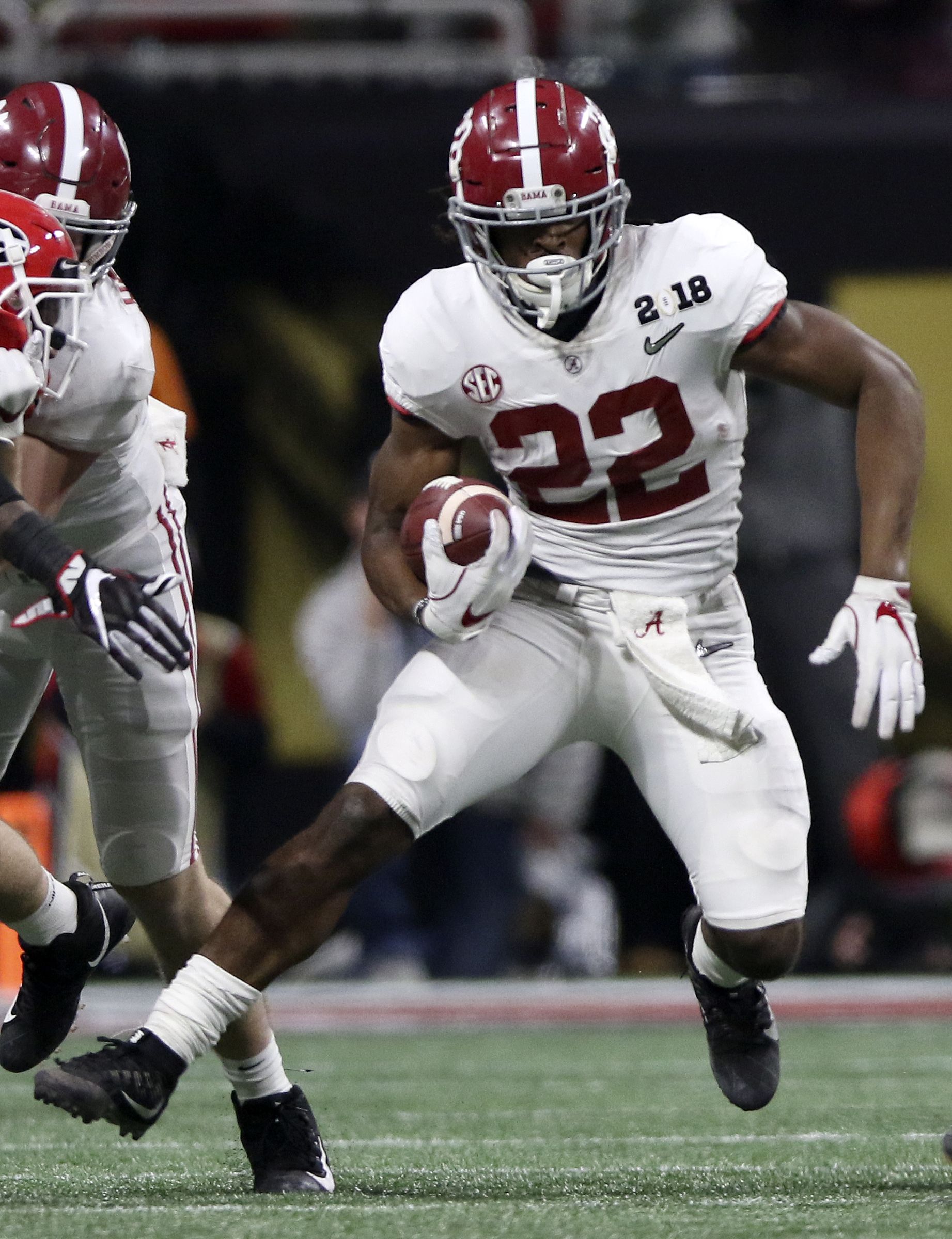 Alabama running back Najee Harris (22) rushes for an 11-yard gain during the College Football Playoff national championship against Georgia at Mercedes-Benz Stadium on Monday, Jan. 8, 2018 in Atlanta, Ga.