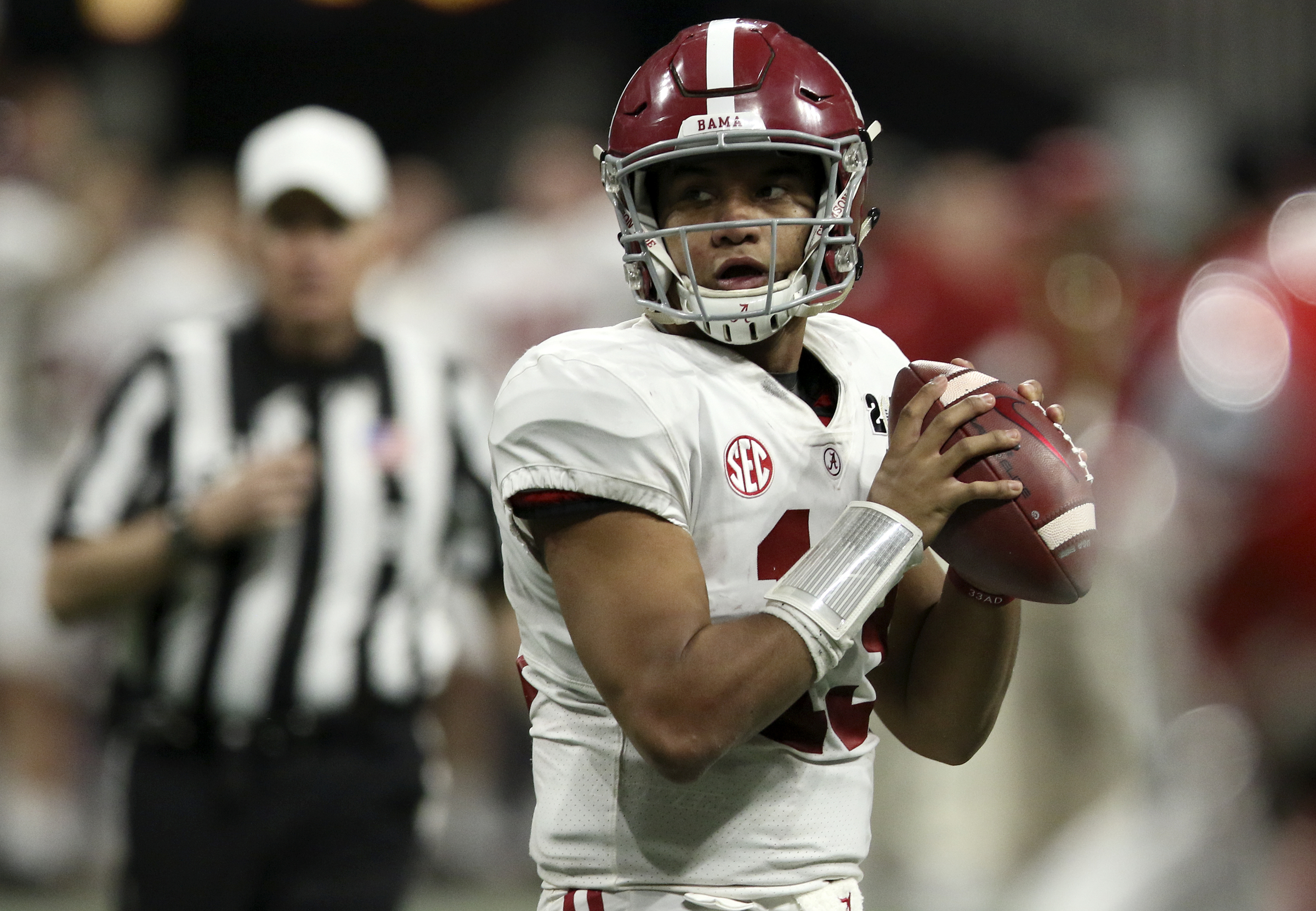 Alabama quarterback Tua Tagovailoa (13) looks to pass against Georgia in overtime of the College Football Playoff national championship at Mercedes-Benz Stadium on Tuesday, Jan. 9, 2018 in Atlanta, Ga.