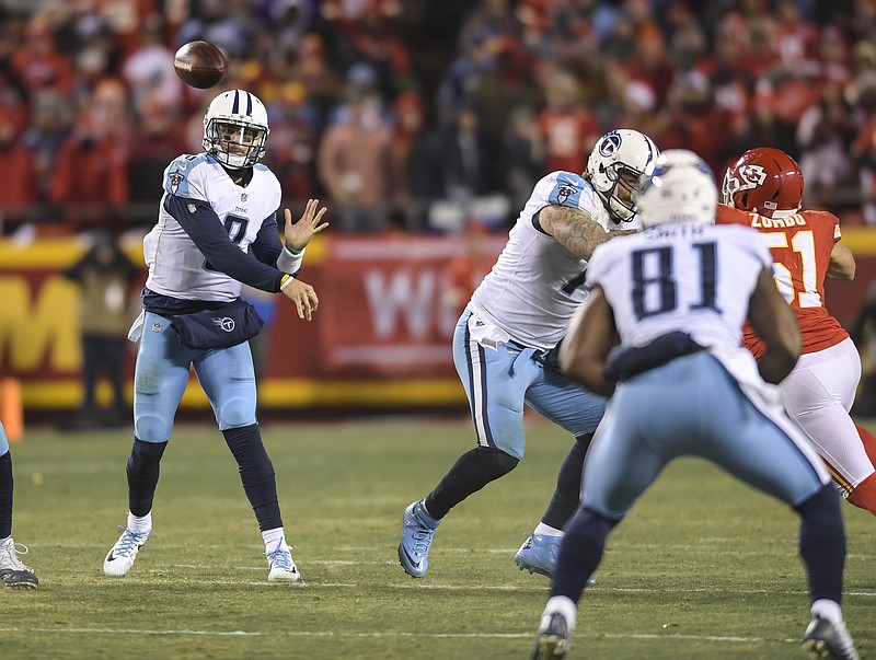 Tennessee Titans quarterback Marcus Mariota (8) throws to Tennessee Titans tight end Jonnu Smith (81) during the second half of an NFL wild-card playoff game in Kansas City, Mo., Saturday, Jan. 6, 2018. (AP Photo/Reed Hoffmann)