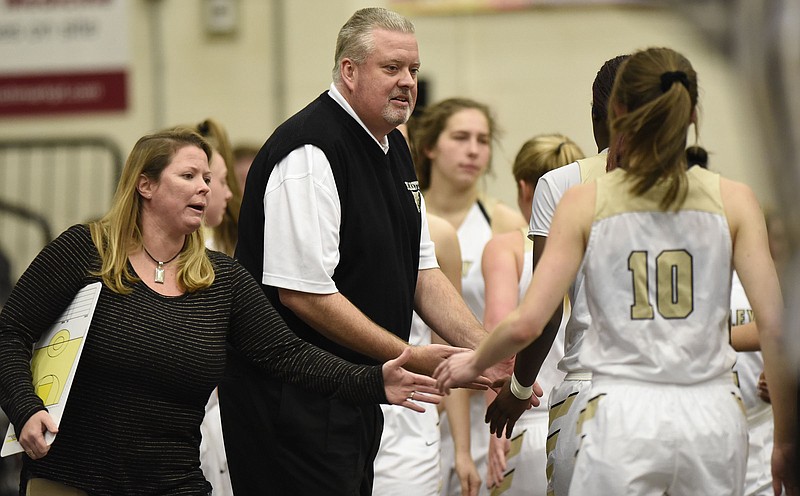 Bradley assistant coach Amy Tinsley, left, and head coach Jason Reuter congratulate the Bearettes as they return to the bench.  The Cleveland Lady Raiders visited the Bradley Central Bearettes in TSSAA basketball action on January 5, 2018.