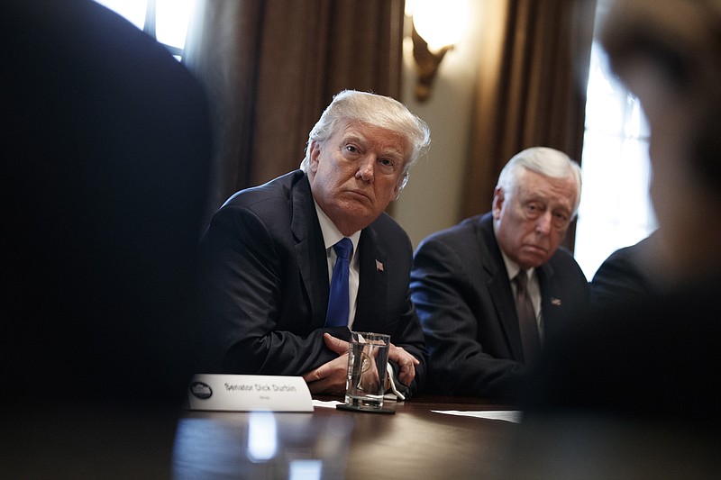 President Donald Trump listens during a meeting with lawmakers on immigration policy in the Cabinet Room of the White House, Tuesday, Jan. 9, 2018, in Washington. (AP Photo/Evan Vucci)