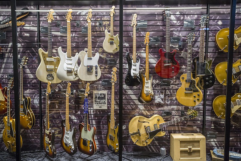 Fender guitars are on display on the opening day of the Songbirds Guitar Museum on Station Street on Saturday, March 11, 2017, in Chattanooga, Tenn. The museum, which houses an extensive collection of classic guitars, held a block party on Station Street to celebrate its opening.