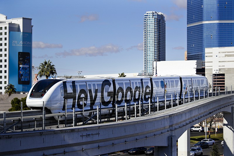 A monorail with a Google advertisement passes the Las Vegas Convention Center during CES International, Wednesday, Jan. 10, 2018, in Las Vegas. (AP Photo/Jae C. Hong)