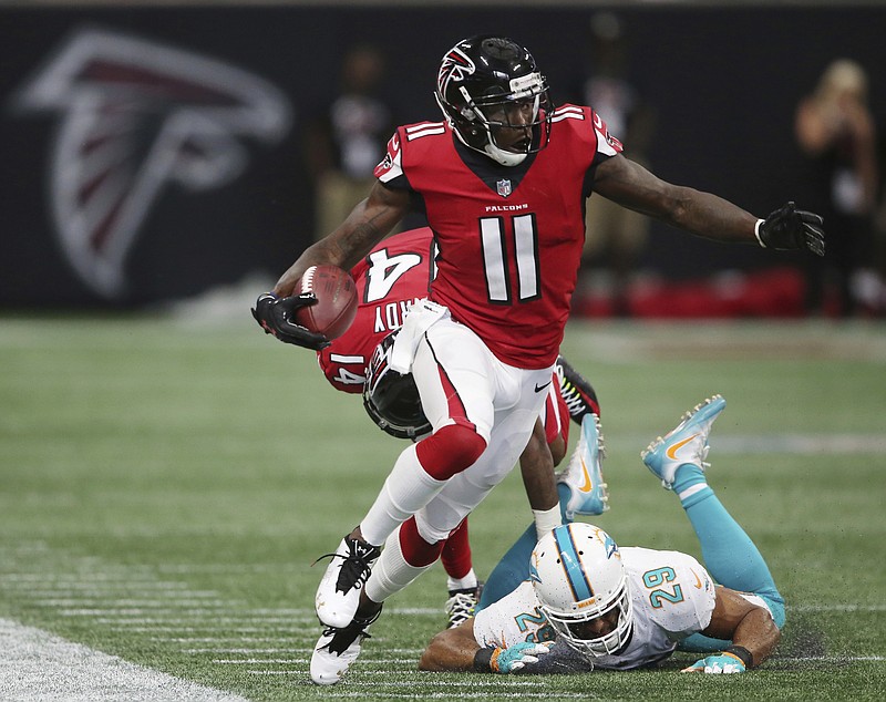 "He has a real process to do that," coach Dan Quinn said. "We're fortunate that he's played with injuries and kind of knows the routine of how to do it." That will be the case again for Saturday's NFC divisional playoff game against the top-seeded Philadelphia Eagles. (AP Photo/John Bazemore, File)