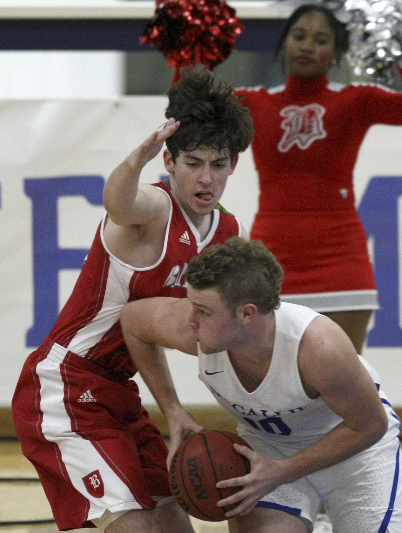 McCallie's Jay Gibson (10) works against Baylor's Patrick Urey (35) at the Walker Forum on the campus of McCallie School on Friday, Jan. 12, 2018 in Chattanooga, Tenn.