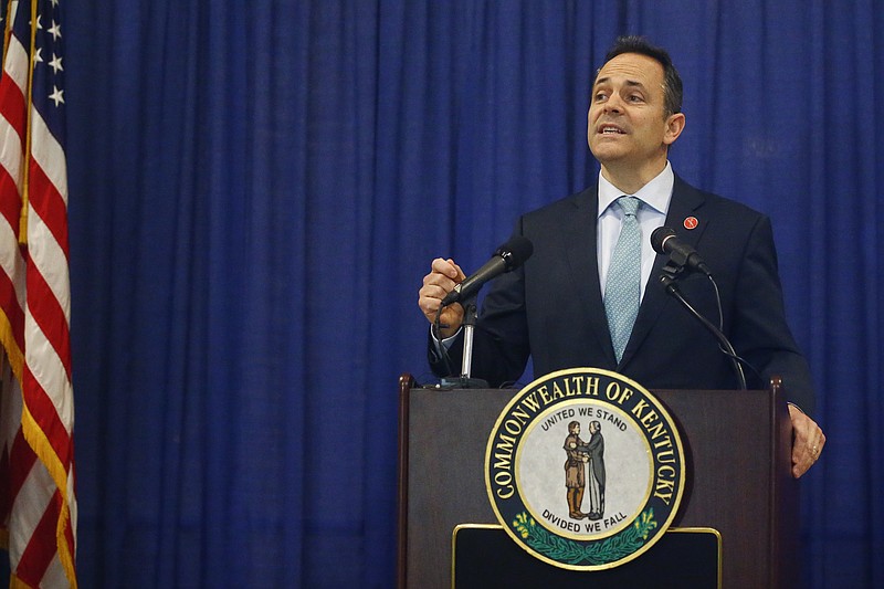 Kentucky Gov. Matt Bevin announces federal approval of Kentucky's Medicaid waiver in the Capitol Rotunda in Frankfort, Ky., Friday, Jan. 12, 2018.