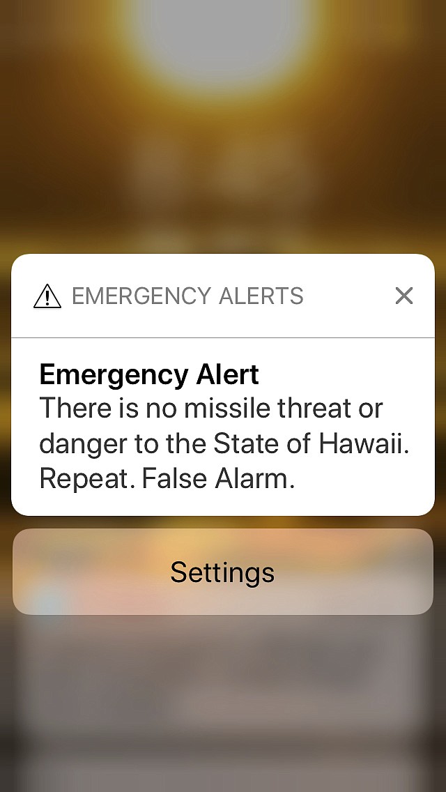 This smartphone screen capture shows the retraction of a false incoming ballistic missile emergency alert sent from the Hawaii Emergency Management Agency system on Saturday, Jan. 13, 2018. Hawaii Sen. Brian Schatz says the false alarm about a missile threat was based on "human error" and was "totally inexcusable." (AP Photo/Caleb Jones)

