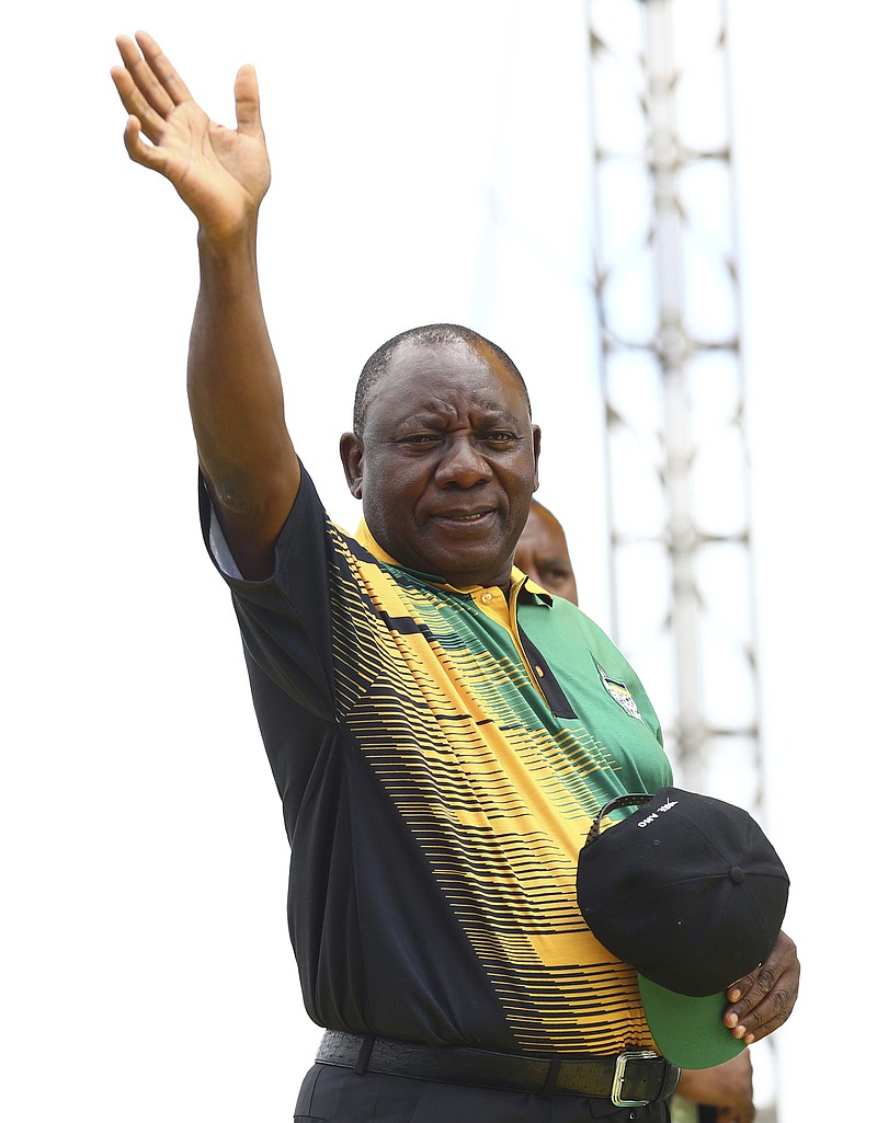 
              Newly-elected ruling African National Congress (ANC) party president Cyril Ramaphosa greets supporters attending the party's 106th birthday celebrations in East London, South Africa, Saturday, Jan. 13, 2018. Ramaphosa is to address supporters for the first time since being elected last month. (AP Photo)
            