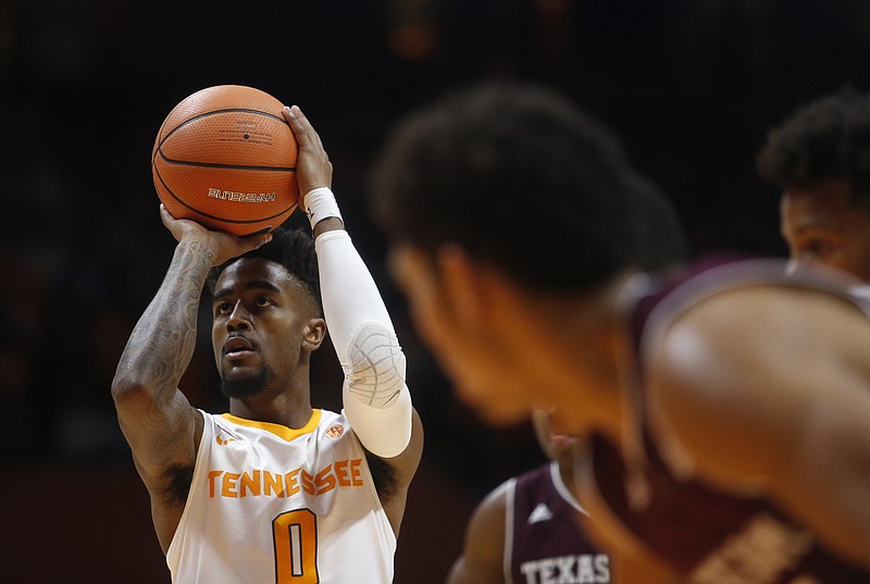 Tennessee guard Jordan Bone (0) shoots free throws against Texas A&M in the first half of an NCAA college basketball game Saturday, Jan. 13, 2018, in Knoxville, Tenn. (AP Photo/Crystal LoGiudice)