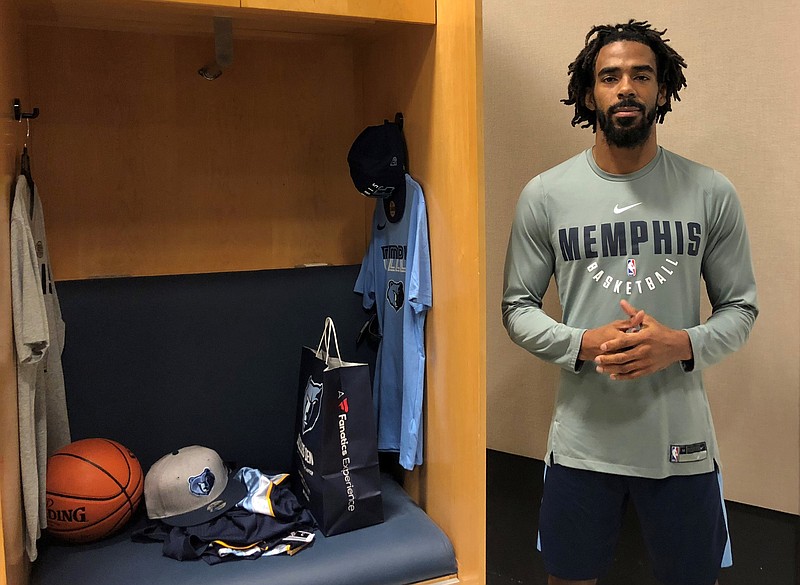 In this Tuesday, Jan. 9, 2018 photo, Memphis Grizzlies guard Mike Conley talks about the influence on today's society of civil rights leader Martin Luther King Jr.  in Memphis, Tenn. When Dr. Martin Luther King Jr. said returning hate for hate multiplies hate, adding deeper darkness to a night devoid of stars, he wasn’t thinking of the world in 2018. More than a half-century later, amid contentious political fights, one of King’s memorable quotes from his book “Strength to Love” remains relevant. (AP Photo/Adrian Sainz)