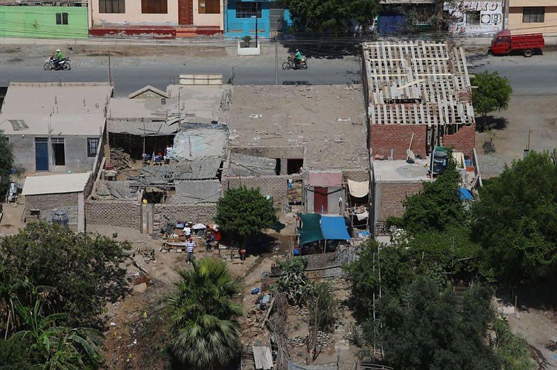 This photo released by Andina Agency shows residents in Chala, Peru, Sunday, Jan. 14, 2018, after an earthquake struck the area. The powerful earthquake struck off Peru's coast early Sunday, tumbling adobe homes in small, rural towns, officials said. (Andina Agency via AP)