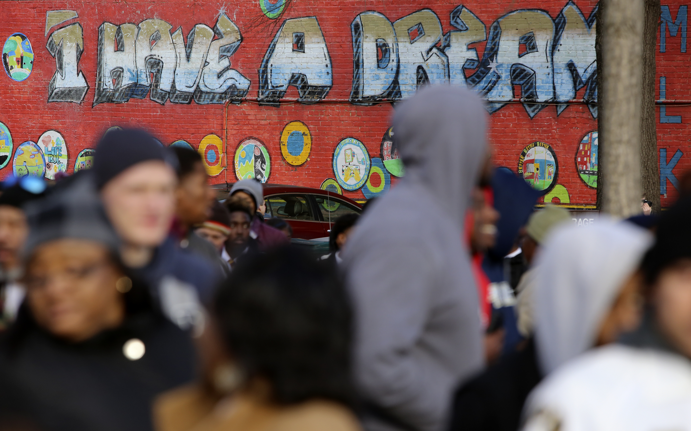 People gather in front of the Bessie Smith Cultural Center after a memorial parade and march along M.L. King Boulevard on Monday, Jan. 15, 2018 in Chattanooga, Tenn. The memorial parade and march was part of the Unity Group of Chattanooga's 48th annual Martin Luther King Jr. Week celebration, which began on Jan. 8th and ended on Martin Luther King Jr. Day.