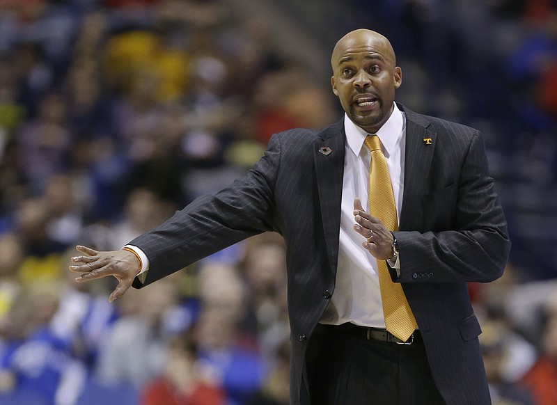 In this 2014 file photo, Tennessee head coach Cuonzo Martin directs his team during the second half of an NCAA Midwest Regional semifinal college basketball tournament game against Michigan in Indianapolis. (AP Photo/Michael Conroy)