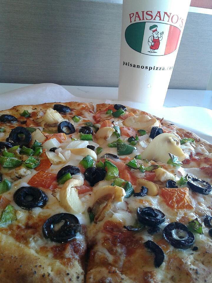 A 10-inch, New York-style veggie pizza at Paisano's Pizza in East Brainerd comes with toppings of green peppers, black olives, tomatoes and mushrooms.