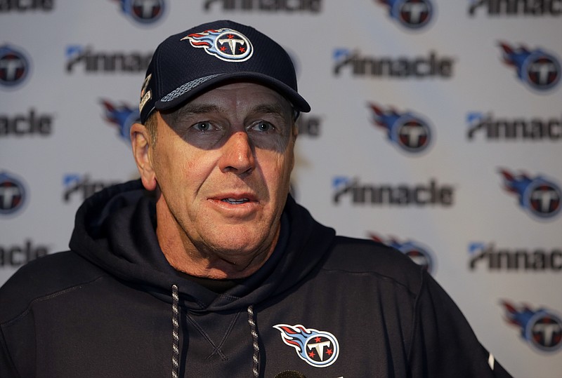 Tennessee Titans head coach Mike Mularkey speaks to the media following an NFL divisional playoff football game against the New England Patriots, Sunday, Jan. 14, 2018, in Foxborough, Mass. (AP Photo/Steven Senne)