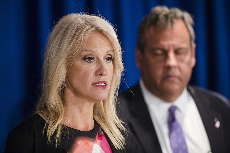 FILE- This is a Monday, Sept. 18, 2017 file photo of Counselor to the President Kellyanne Conway accompanied by New Jersey Gov. Chris Christie as she speaks during a news conference in Trenton, N.J.