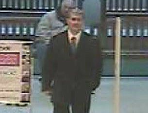 The man pictured here in a Belk department store in Walnut Square Mall is suspected of stealing a cookware set valued at $500.