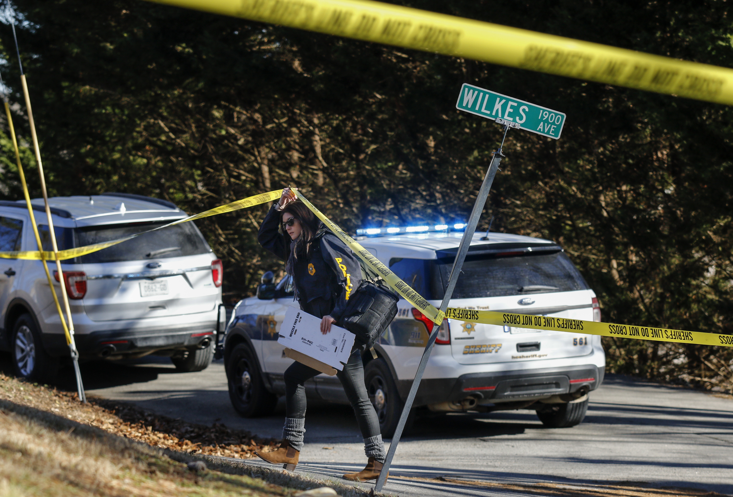 A TBI agent arrives after a shooting involving a Hamilton County Sheriff's Office deputy on Wilkes Avenue on Friday, Jan. 19, 2018, in Soddy-Daisy, Tenn. TBI is investigating the shooting.