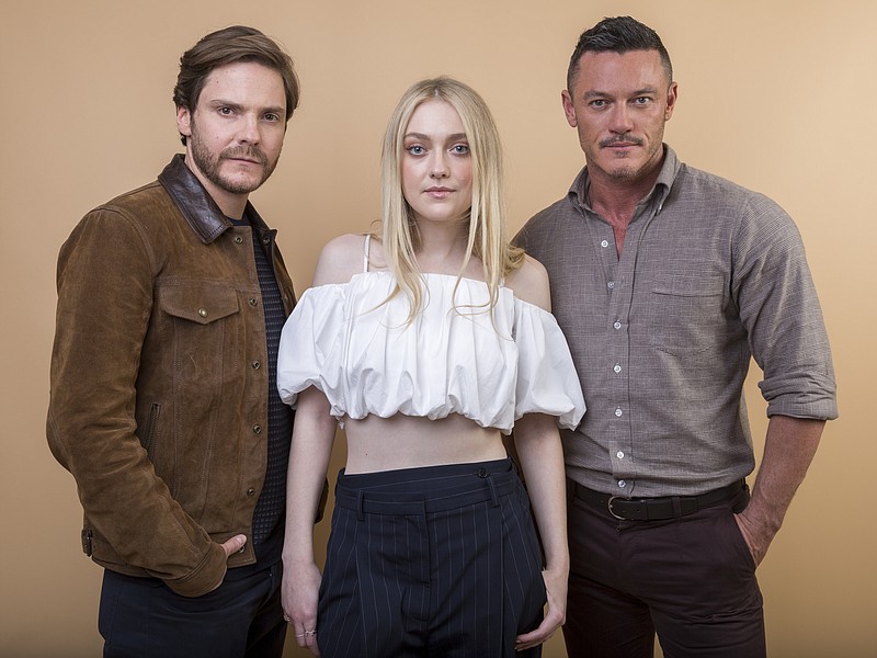 
              Daniel Bruhl, from left, Dakota Fanning and Luke Evans cast members in the TNT series "The Alienist" pose for a portrait during the 2018 Television Critics Association Winter Press Tour at the Langham Hotel on Thursday, Jan. 11, 2018, in Pasadena, Calif. (Photo by Willy Sanjuan/Invision/AP)
            