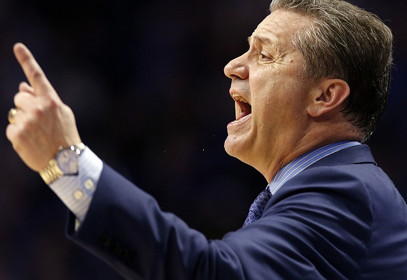 
              Kentucky coach John Calipari gestures to his team during the second half of an NCAA college basketball game against Florida, Saturday, Jan. 20, 2018, in Lexington, Ky. Florida won 66-64. (AP Photo/James Crisp)
            