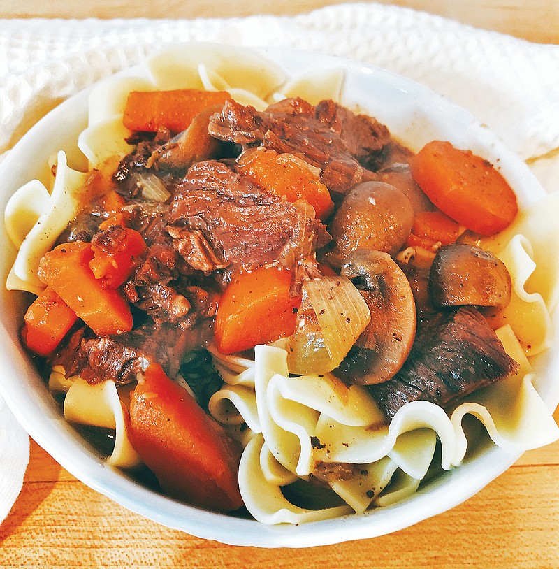 This Burgundy Beef Stew was made with an electric pressure cooker. Serve the stew over egg noodles, mashed potatoes or gnocchi for a satisfying cold-weather meal. (Elizabeth Karmel/The Associated Press)