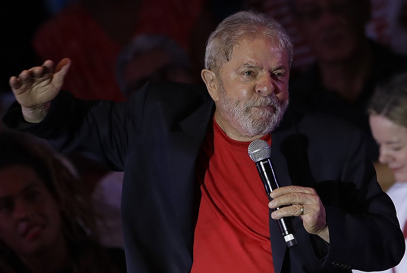 
              In this Jan. 18, 2018 photo, former Brazilian President Luiz Ignacio Lula da Silva speaks during a meeting with artists and intellectuals in Sao Paulo, Brazil. Brazilian judges are scheduled to rule Wednesday on the former President's appeal of his conviction on corruption and money laundering charges. The decision could prevent da Silva from running in this year’s presidential elections and even potentially end the career of the enduringly popular politician. Here’s a look at the case and its importance. (AP Photo/Andre Penner)
            