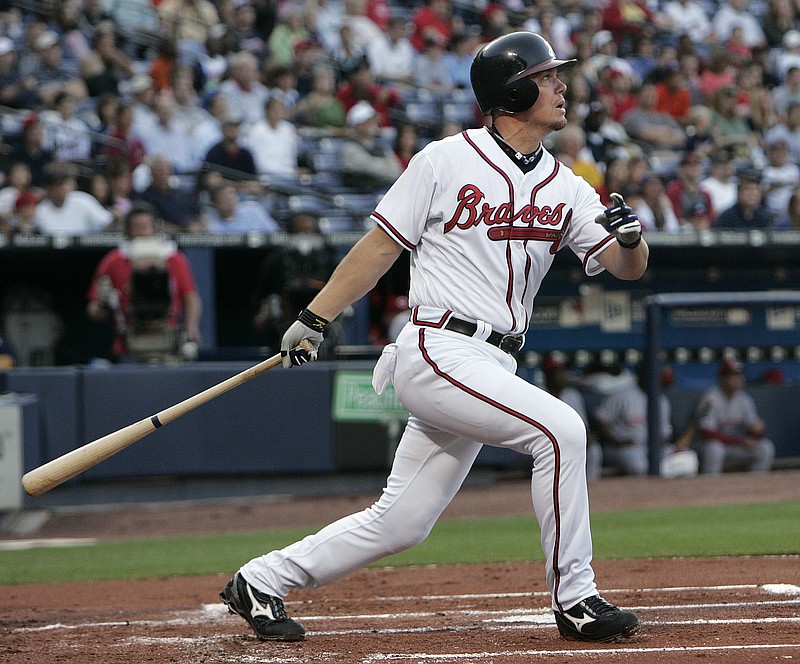 FILE - In this May 3, 2008, file photo, Atlanta Braves' Chipper Jones drives in a run with a double in the first inning of a baseball game against the Cincinnati Reds, in Atlanta. When Chipper Jones took stock of all of the familiar names he's on the cusp of rejoining, he wondered if it might be time to expand the Baseball Hall of Fame. "We need to see if we can erect our own room in Cooperstown," he quipped, flashing that dry sense of humor he was known for during his playing days. All signs point to Jones becoming the latest member of those great Atlanta Braves teams of the 1990s and early 2000s to enter the Hall when the next group of inductees is revealed on Wednesday, Jan. 24, 2018.(AP Photo/John Bazemore, File)