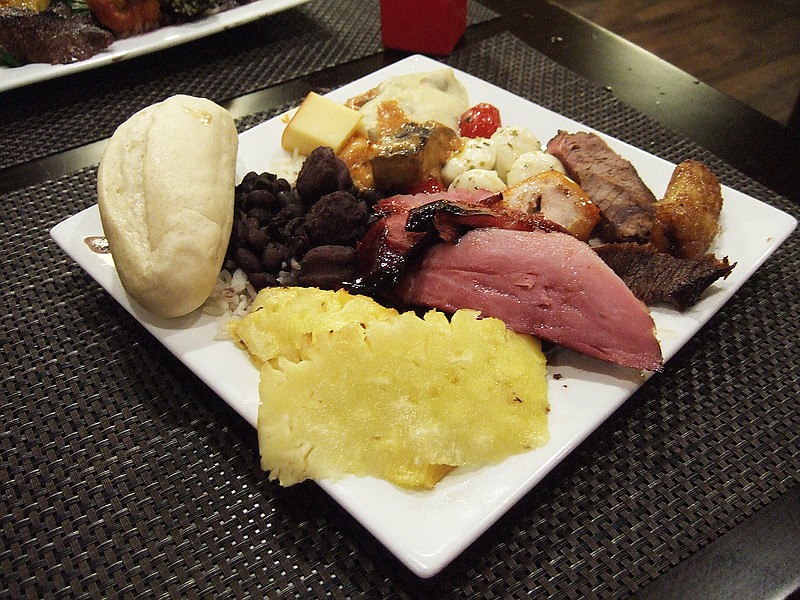 Unlike at a typical restaurant, the combination of items on a plate at the Rodizio Grill is likely to change throughout the meal as servers make their rounds offering different meats to try.