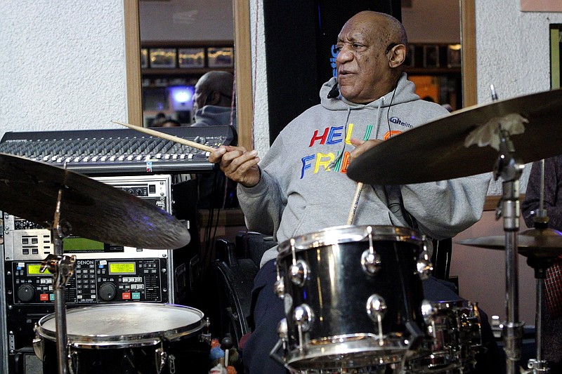 
              Bill Cosby plays the drums at the LaRose Jazz Club in Philadelphia on Monday, Jan. 22, 2018. It was his first public performance since his last tour ended amid protests in May 2015. Cosby has denied allegations from about 60 women that he drugged and molested them over five decades. He faces an April retrial in the only case to lead to criminal charges. (AP Photo/Michael R. Sisak)
            