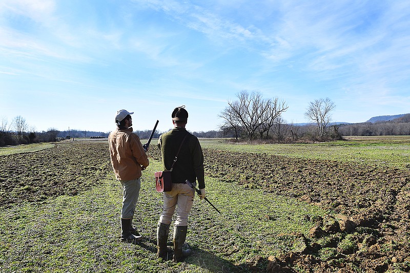 From left, Eliot Berz and Rick Huffines begin the hunt.