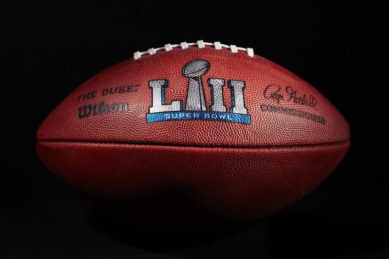 An official ball for the NFL Super Bowl LII football game from the Wilson Sporting Goods Co. in Ada, Ohio, is displayed Monday, Jan. 22, 2018. The New England Patriots will play the Philadelphia Eagles in the Super Bowl on Feb. 4, in Minneapolis, Minn. (AP Photo/Rick Osentoski)