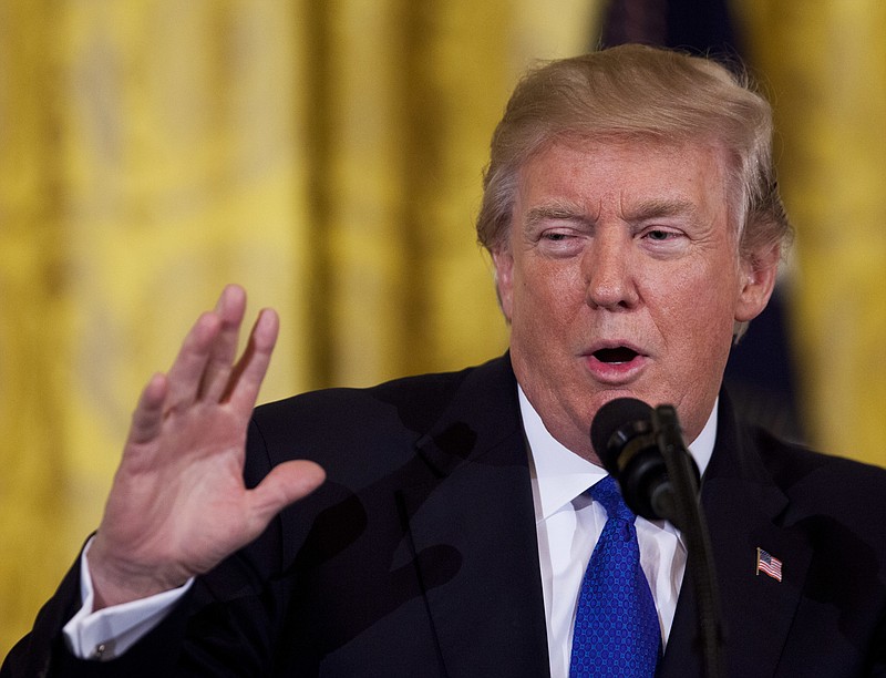 President Donald Trump speaks to a gathering of mayors in the East Room of the White House in Washington, Wednesday, Jan. 24, 2018. (AP Photo/Manuel Balce Ceneta)