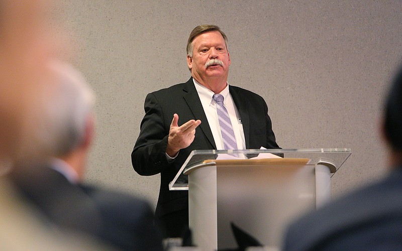 Hamilton County Mayor Jim Coppinger invites a speaker to the podium during a legislative breakfast Thursday, Jan. 4, 2018, at the Doubletree Hotel in Chattanooga, Tenn.