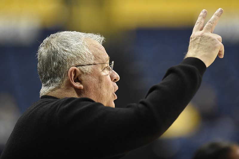 UTC head coach Jim Foster directs his team from the sidelines.  The University of North Carolina Greensboro Trojans visited the University of Tennessee Chattanooga Mocs in Southern Conference women's basketball action at McKenzie Arena on January 4, 2018.