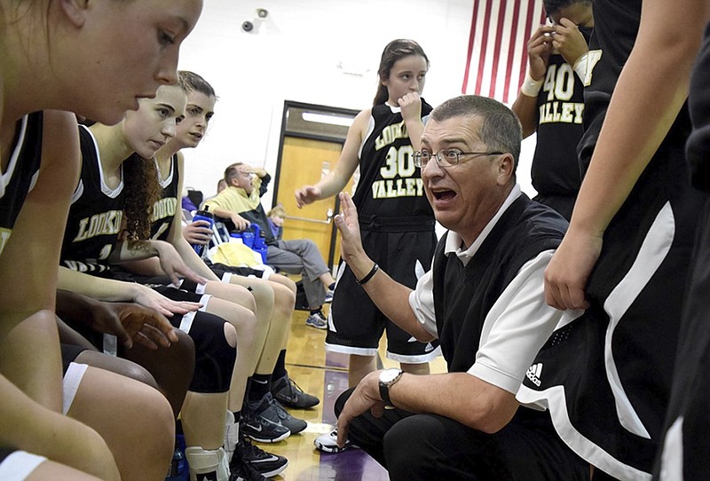 Lookout Valley girls' basketball coach Darren Crownover talks to his team during a game against Marion County in January 2017. The Lady Yellow Jackets lost 80-29 to visiting Tellico Plains on Friday night.