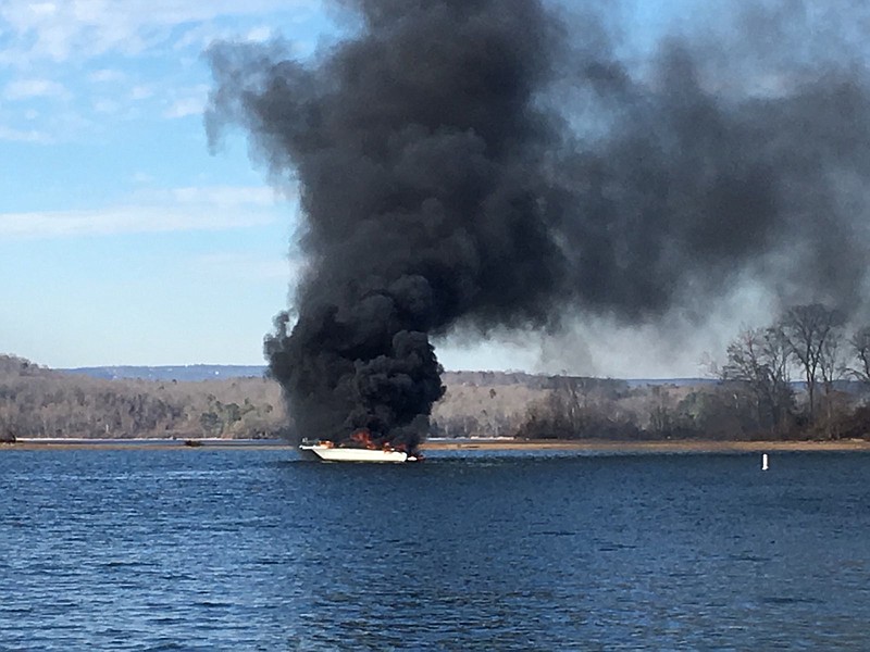 Boat fire at Island Cove Marina.