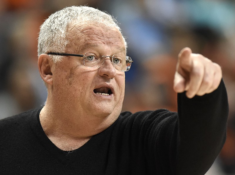 Chattanooga head coach Jim Foster instructs his Mocs from the sidelines.  Foster was denied his 900 victory as Chattanooga fell to Mercer 71 to 50.  The Mercer Bears visited the University of Tennessee Chattanooga Mocs in Southern Conference women's basketball action at McKenzie Arena on January 27, 2018.