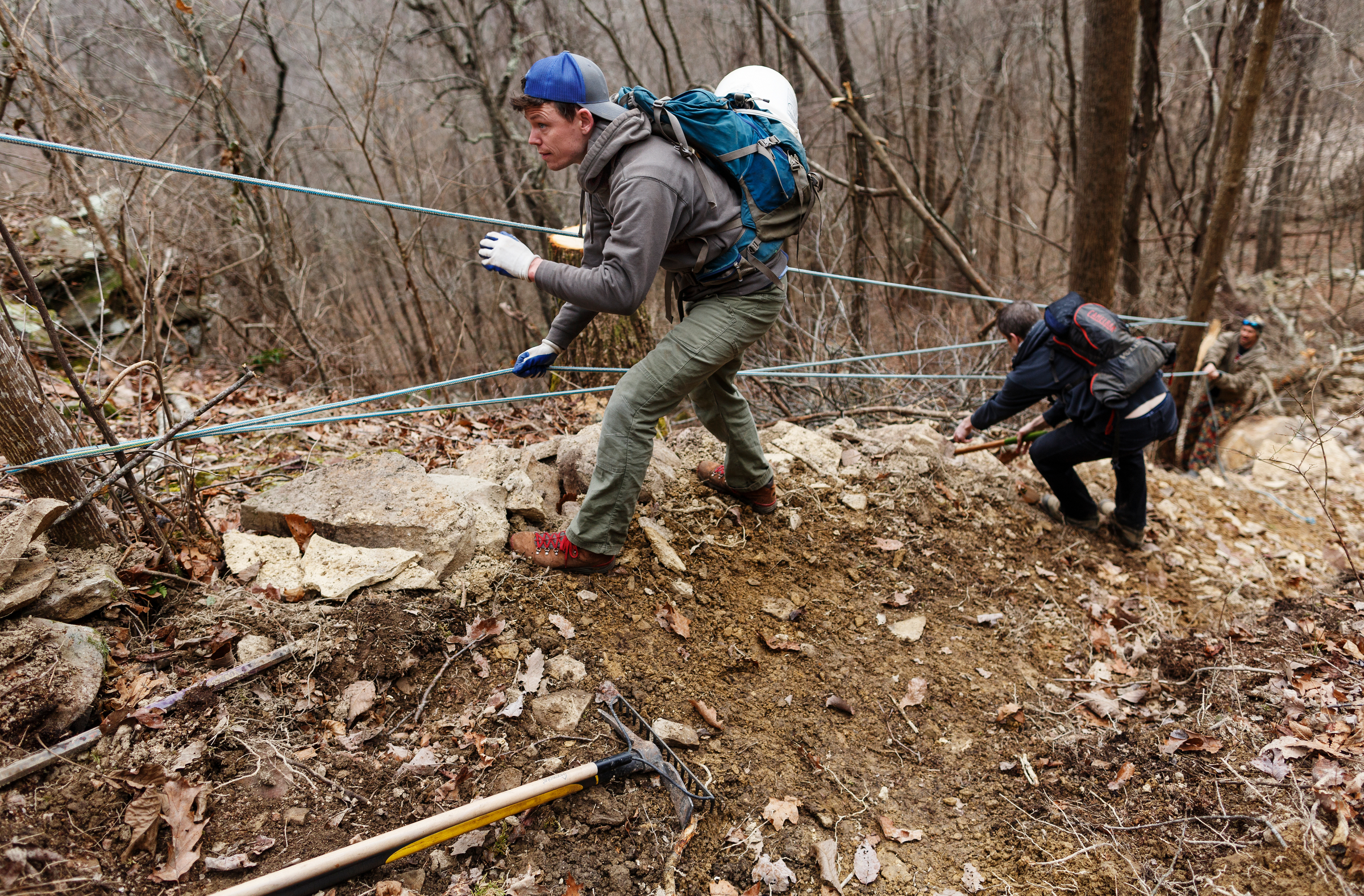 Les Warnock, left, and Leith McLeod set up a safety line on the TTC Gravity Park trail on Saturday, Jan. 27, 2018, in Sequatchie, Tenn. Volunteers are working to reopen the downhill mountain biking trail which features 1,000 feet of elevation change on a challenging course.