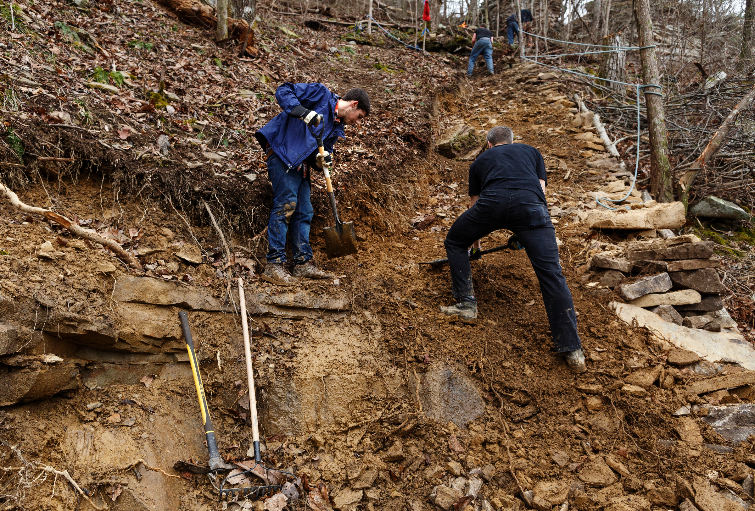 Logan Gross, left, and Leith McLeod clear a portion of the TTC Gravity Park trail on Saturday, Jan. 27, 2018, in Sequatchie, Tenn. Volunteers are working to reopen the downhill mountain biking trail which features 1,000 feet of elevation change on a challenging course.