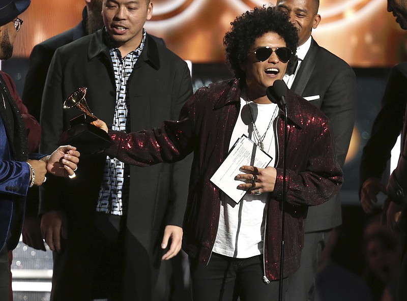 Bruno Mars accepts the award for song of the year for "That's What I Like" at the 60th annual Grammy Awards at Madison Square Garden on Sunday, Jan. 28, 2018, in New York. (Photo by Matt Sayles/Invision/AP)