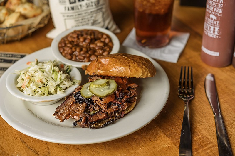 The beef brisket sandwich is a popular item at Jim 'N Nick's Bar-B-Q, set to open this fall at Hamilton Place mall.