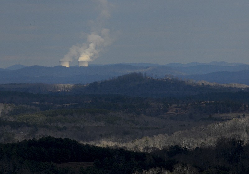 The cooling towers at Watts Bar Nuclear Plant emit steam Tuesday in this view from Flat Top Mountain, near Soddy-Daisy.