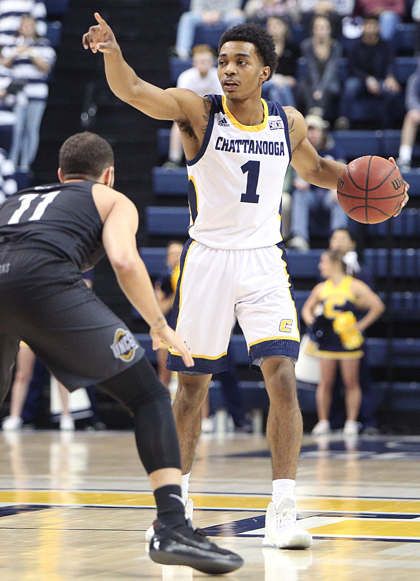 University of Tennessee at Chattanooga's Rodney Chatman (1) calls out a play to teammates during the UTC vs. University of North Carolina Greensboro men's basketball game Monday, Jan. 29, 2018 at McKenzie Arena at UTC in Chattanooga, Tenn.