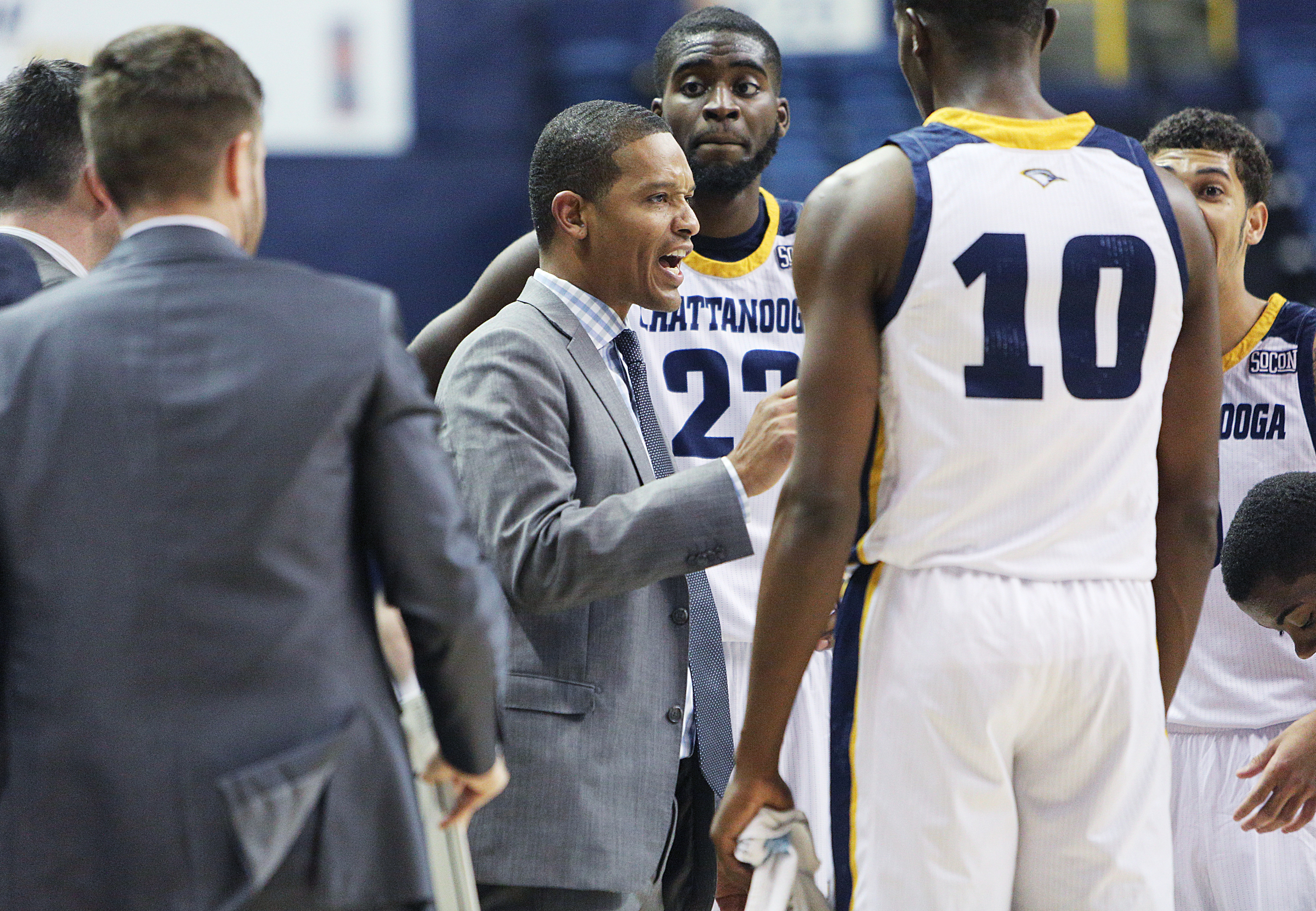 University of Tennessee at Chattanooga men's basketball coach Lamont Paris talks with his team during a game against UNC Greensboro this past January at McKenzie Arena.